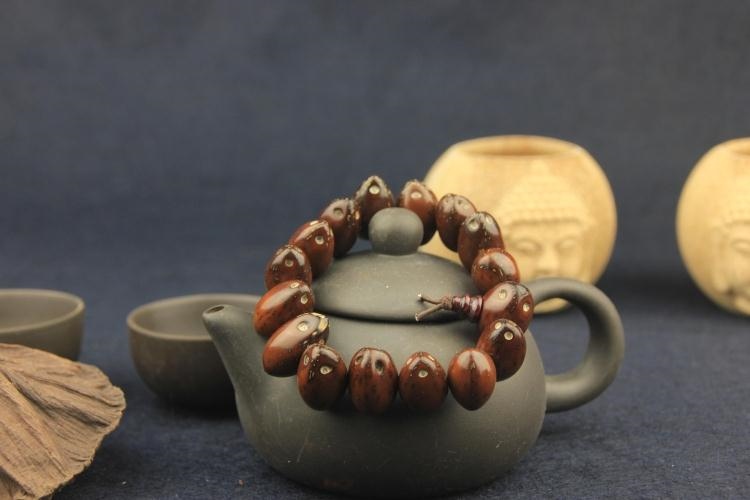 2、紫金鼠适合什么生肖戴